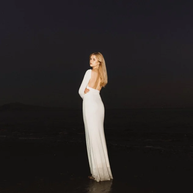 Go the Distance single artwork, Chloe in a white dress on the beach at night
